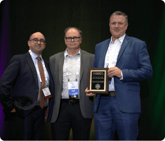 Olympia leadership accepting the MSC Agent of the Year award
