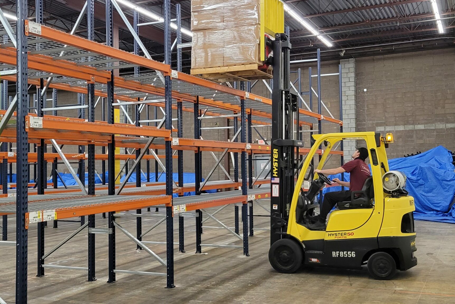 Racked pallet storage inside Olympia's commercial warehouse
