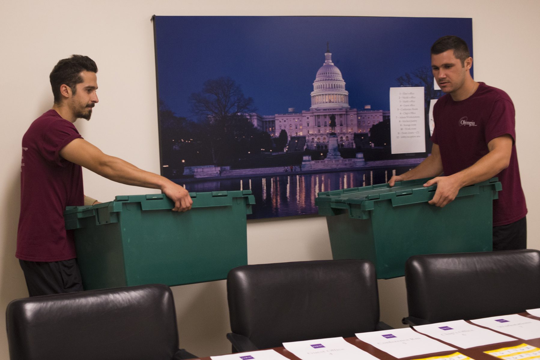Stacked rental moving crates delivered to an office