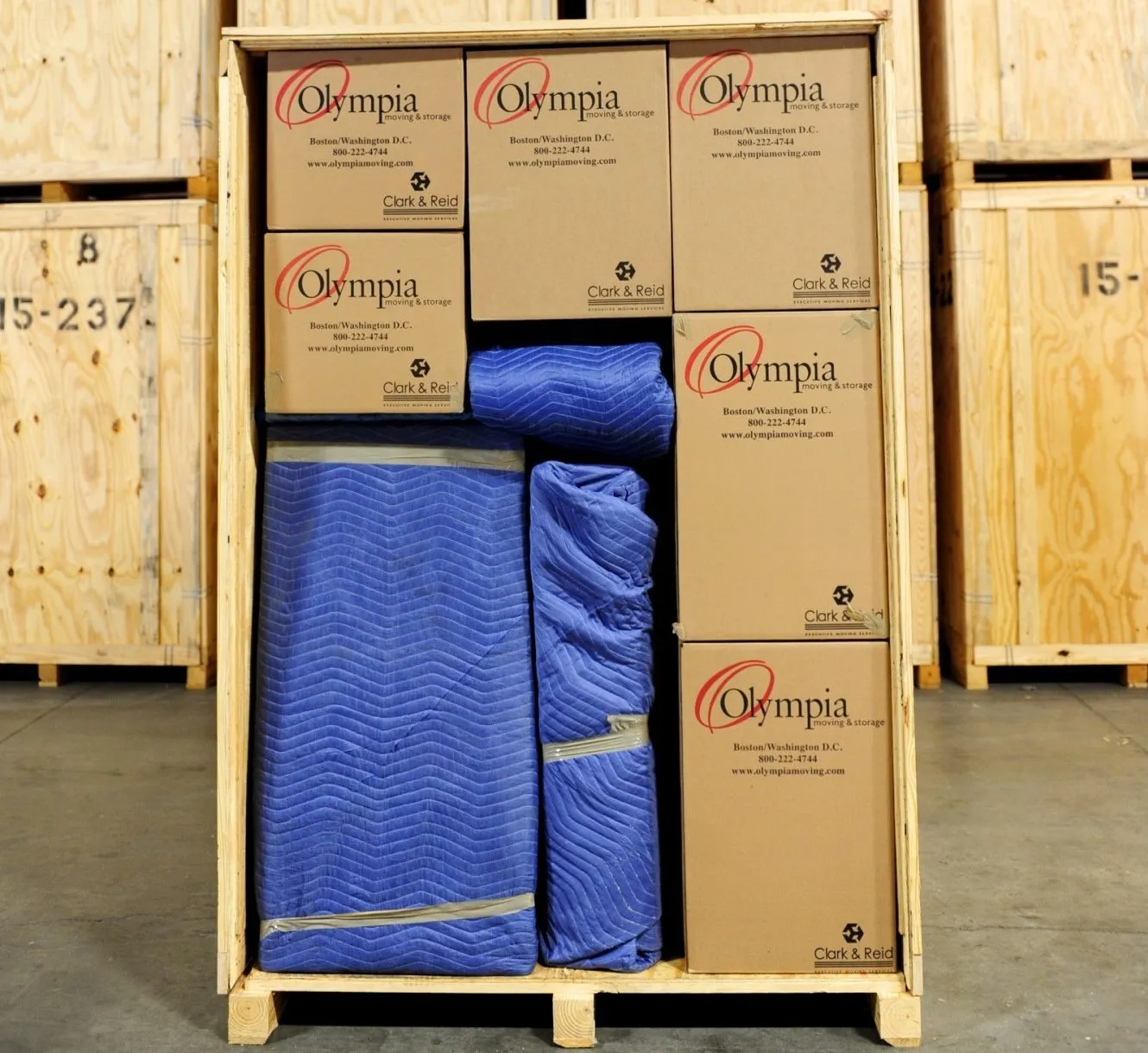 Olympia warehouse team member handling palletized storage
