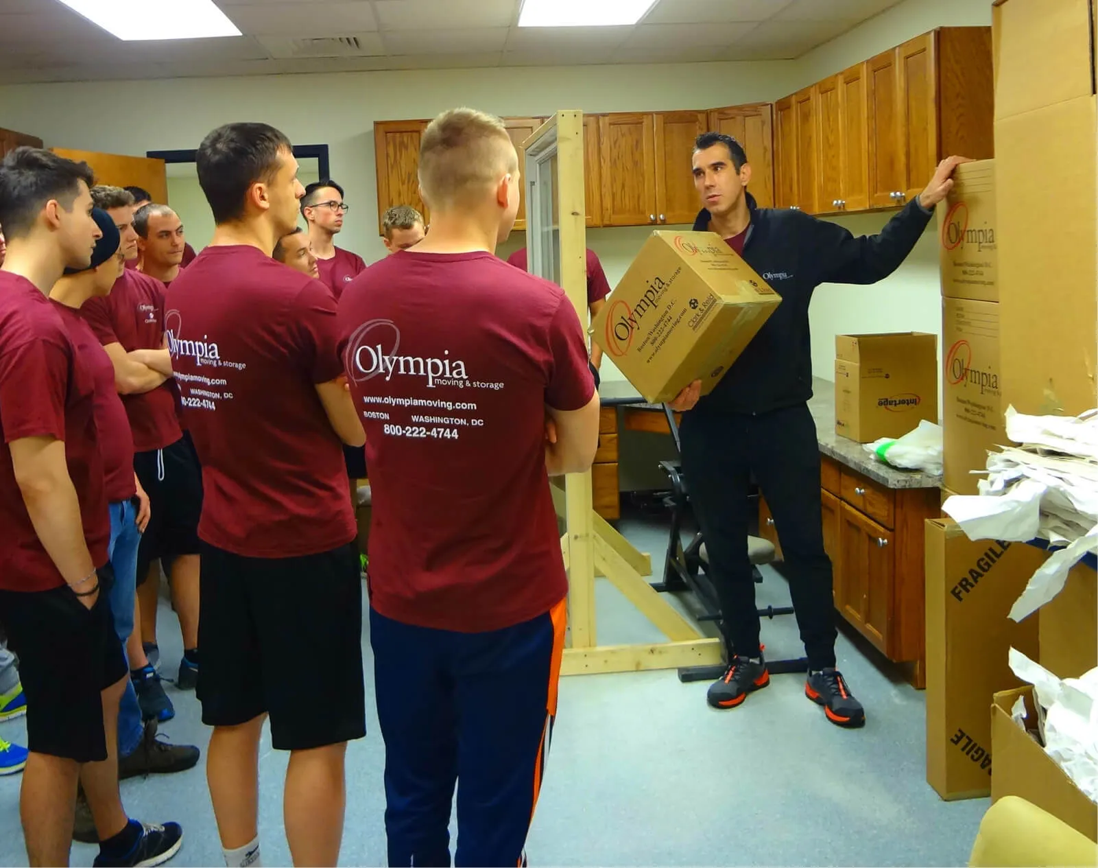 Olympia crew members in a hands-on training session