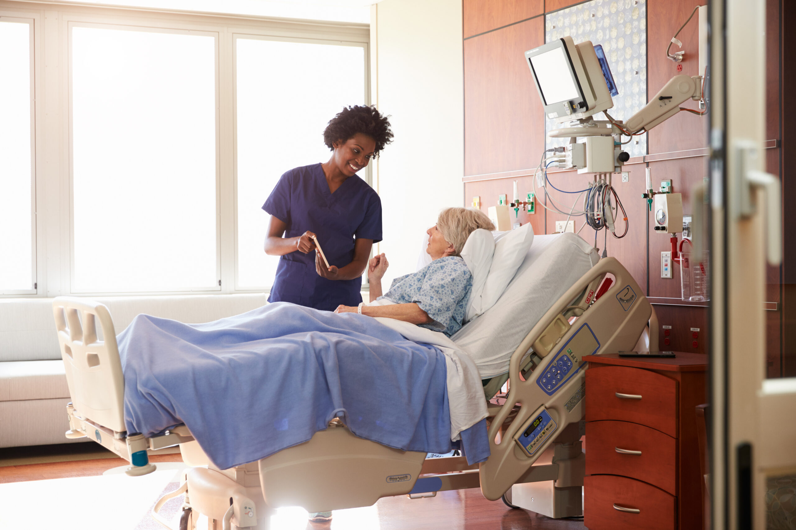 Medical equipment being moved through a hospital corridor
