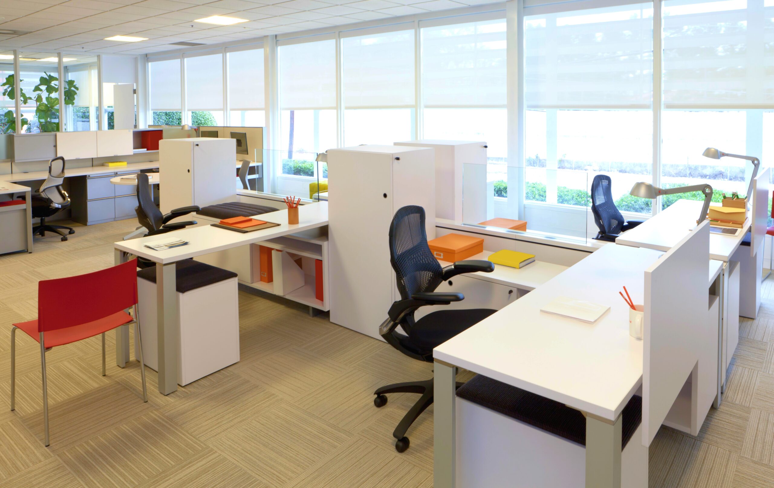 Installers assembling office workstations and furniture