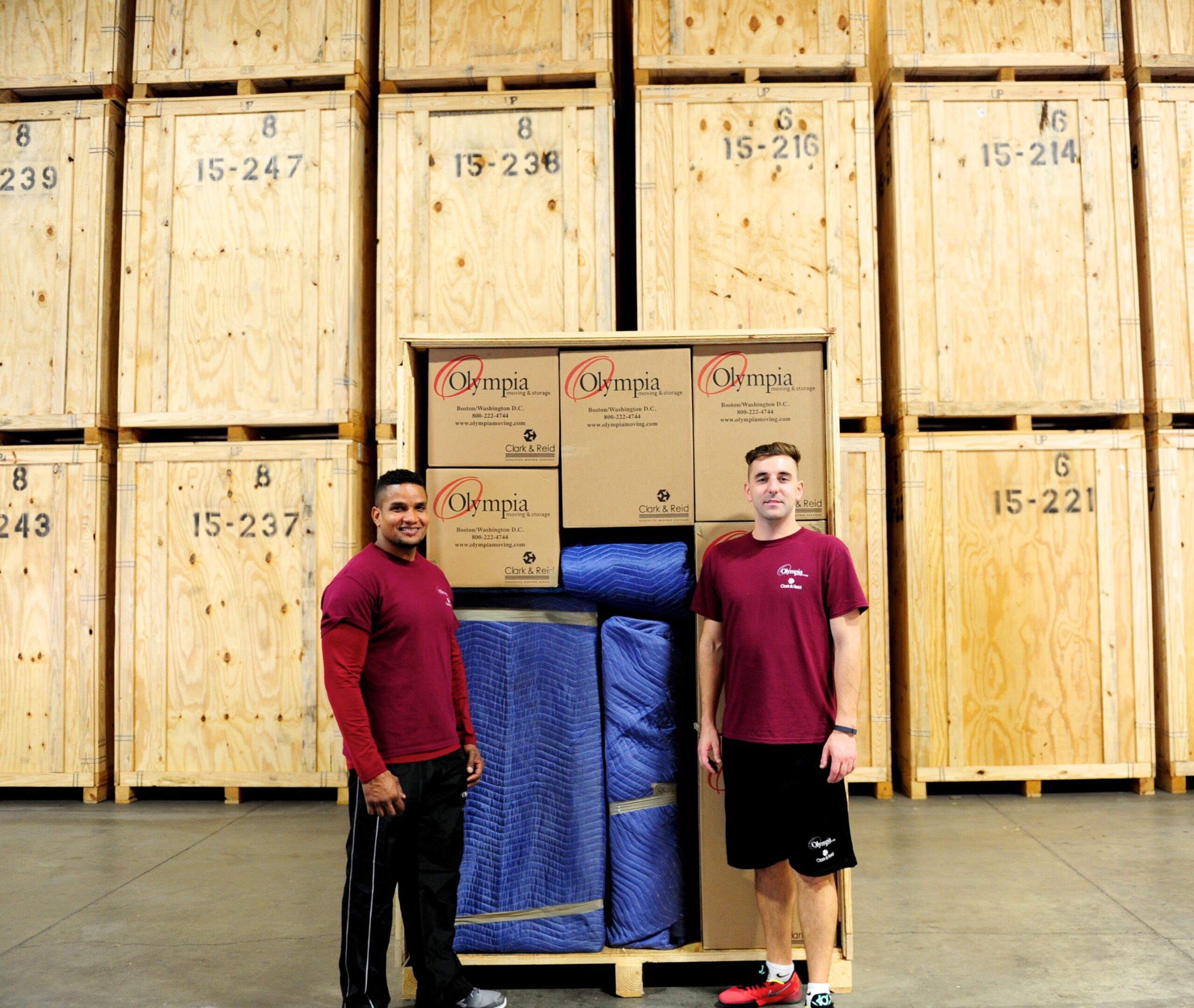 Palletized and shrink-wrapped items in Olympia's storage warehouse